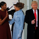 U.S. first lady Michelle Obama (L) greets U.S. President-elect Donald Trump (R) and his wife Melania for tea before the inauguration at the White House in Washington, U.S. January 20, 2017. REUTERS/Jonathan Ernst - RTSWH9R